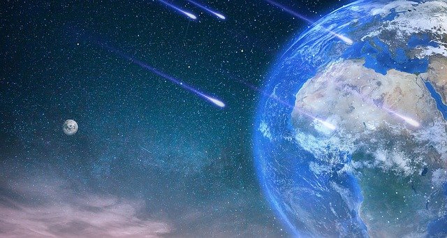 宇宙と流れ星の画像